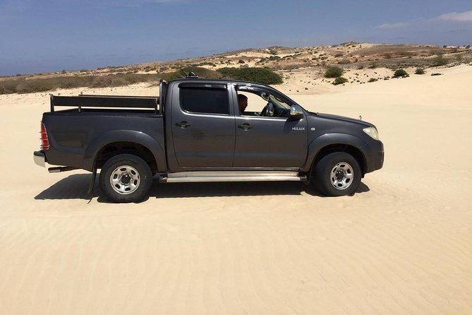 Boa Vista Island: Half-day Tour + Santa Monica Beach by 4x4 - Praia da Varandinha: caves, dunes, and a rough coastal drive