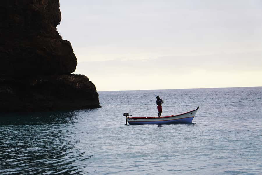 From Praia: Boat Trip, Snorkeling, Cave & BBQ on the Beach - Lunch on a black-sand beach