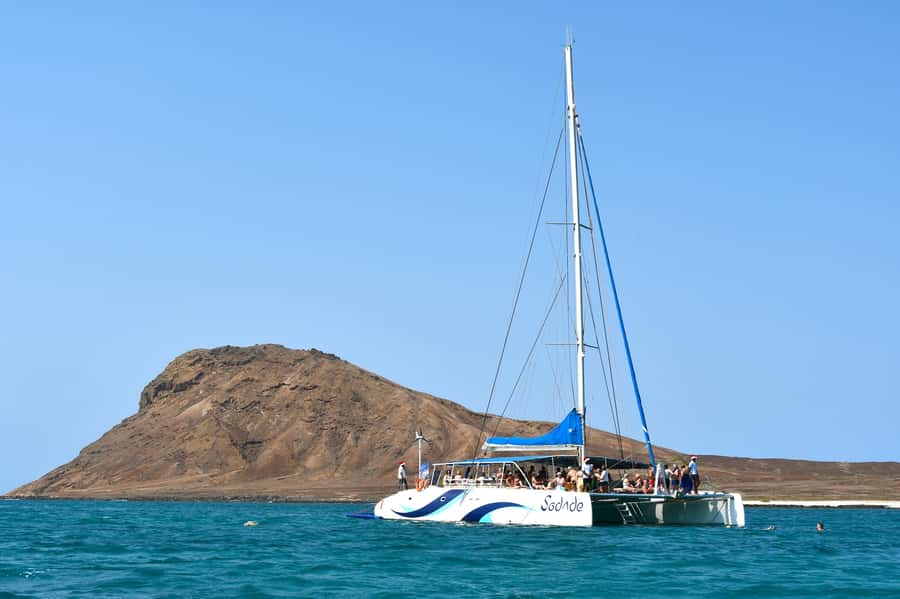 Sal: All-Inclusive Half-Day Lounge Catamaran Cruise - The swimming stop near the rocky coast